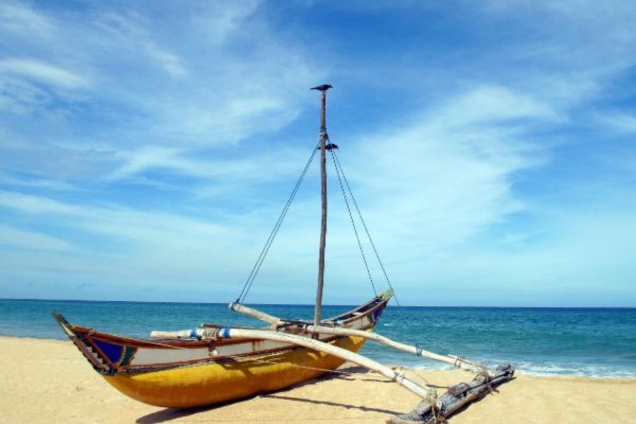 A sailing boat at Negombo beach in Sri Lanka